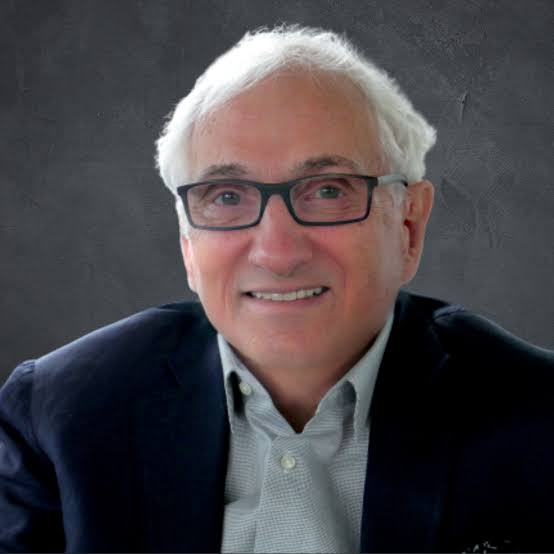 Headshot of Jerry Wind. Image of man with white hair wearing glasses