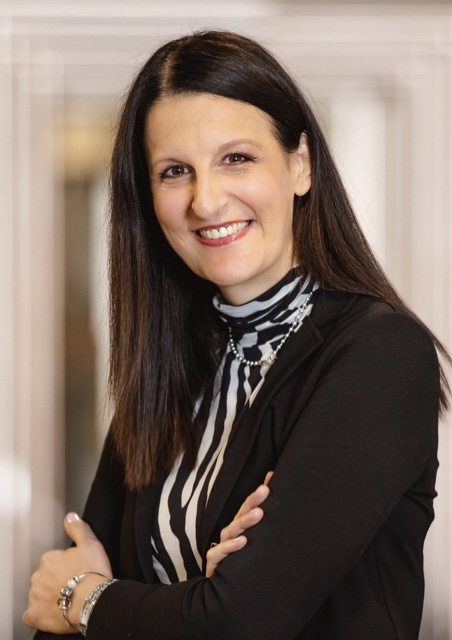 Margherita PAGANI Headshot of Margherita Pagani. A person with long black hair
