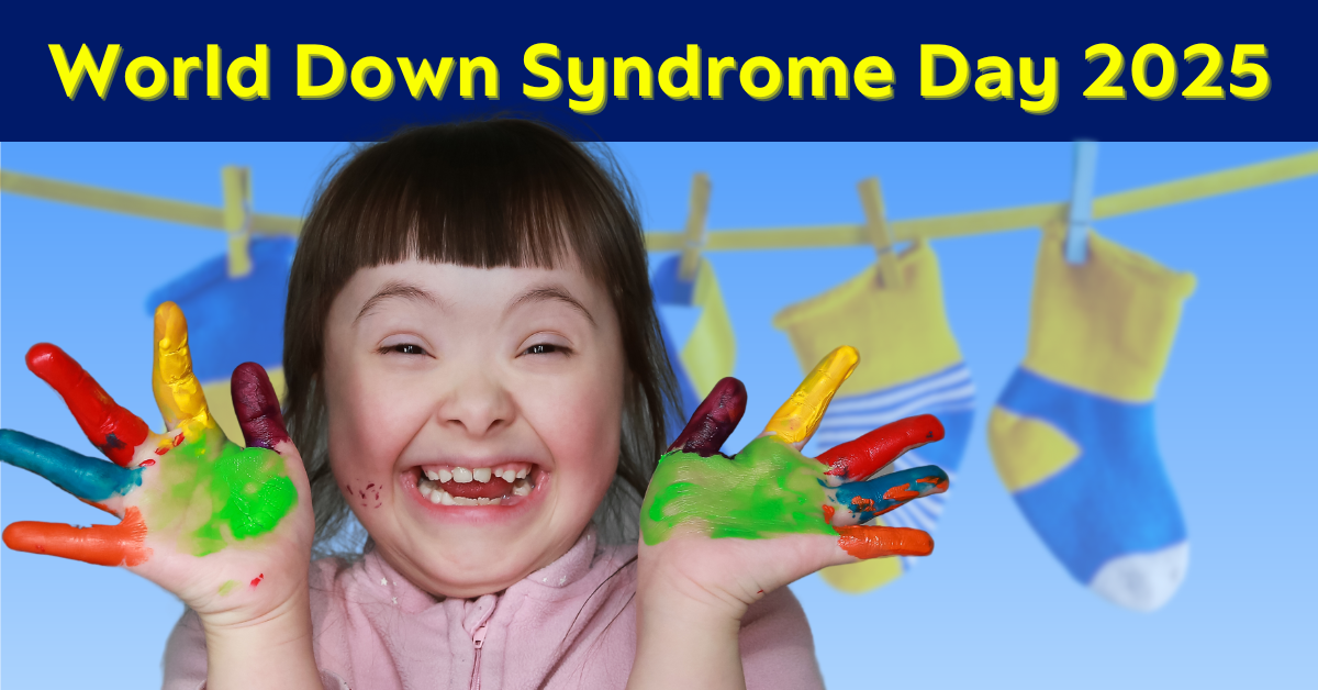 A cheerful young girl with Down syndrome smiles joyfully with brightly painted hands with the text 