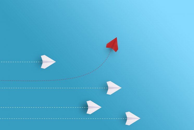 Data-driven practices for school improvement with charts, graphs, and students in a classroom