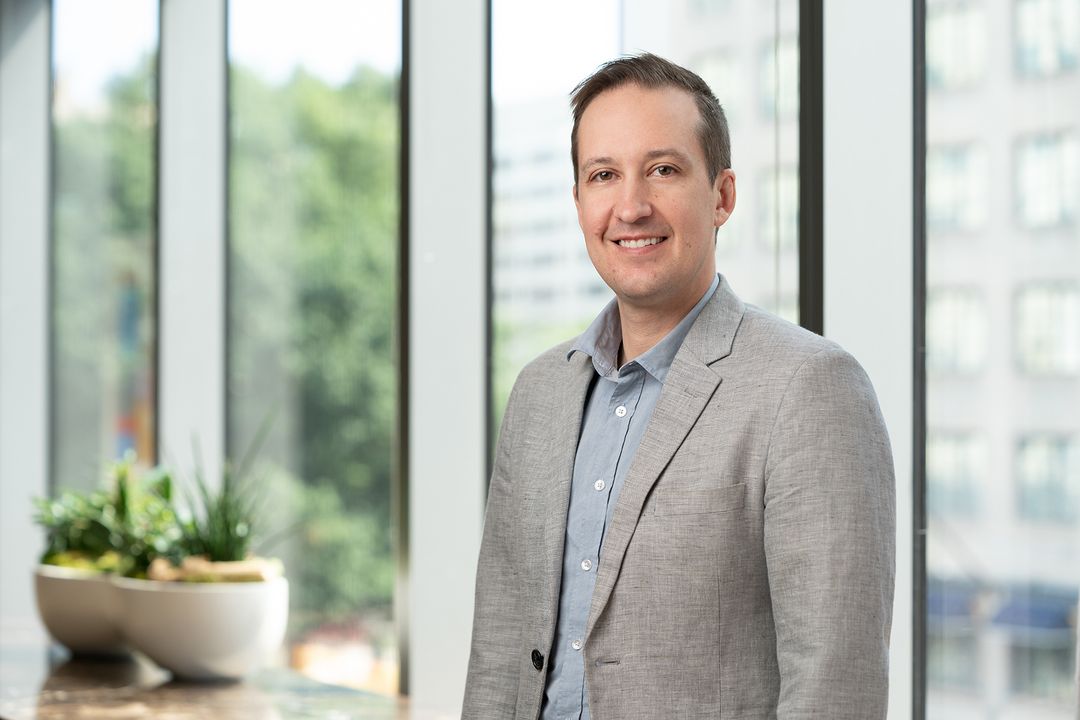 Image of man in a shirt and blazer