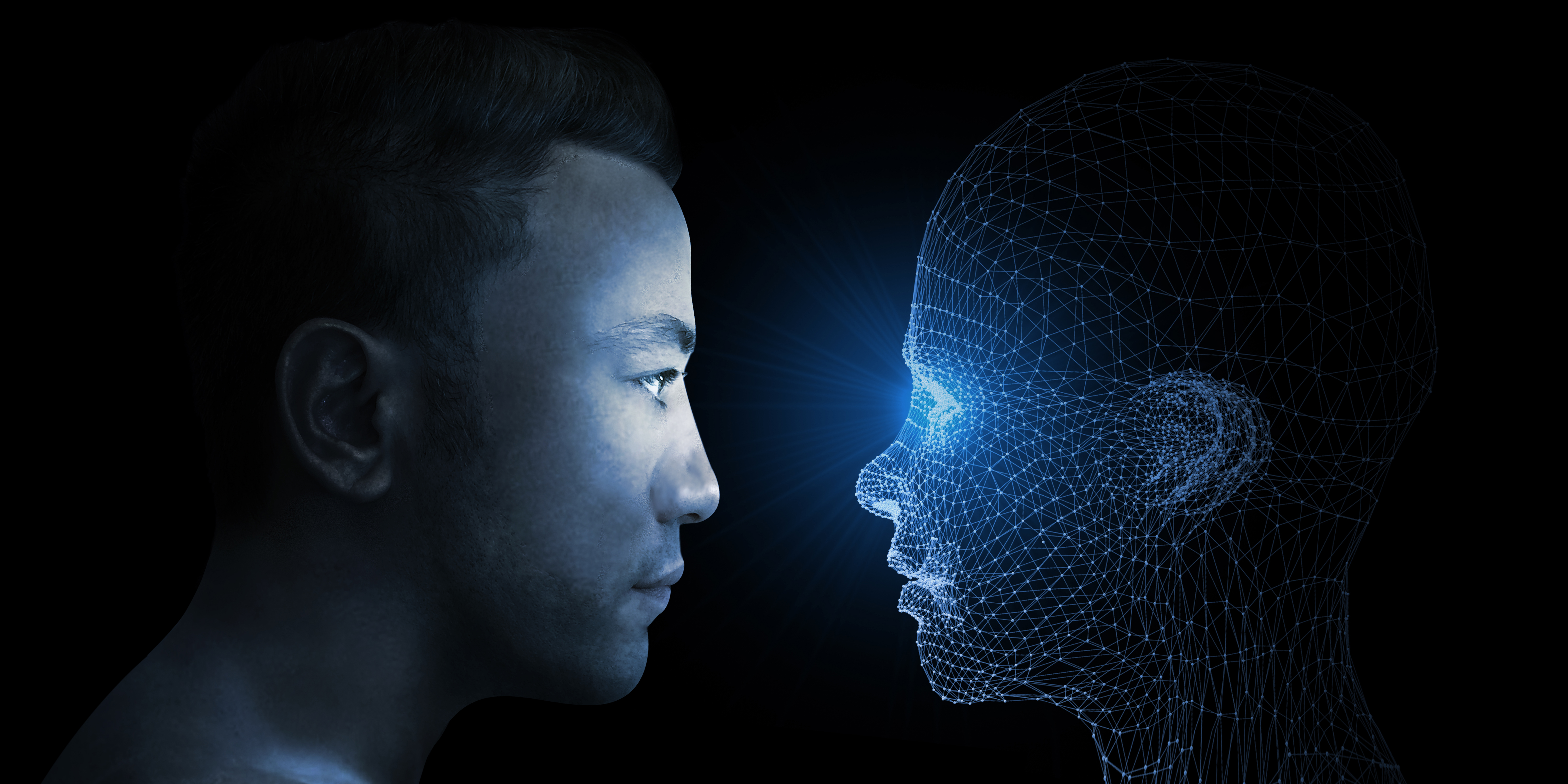 A human face and digital face looking at each other